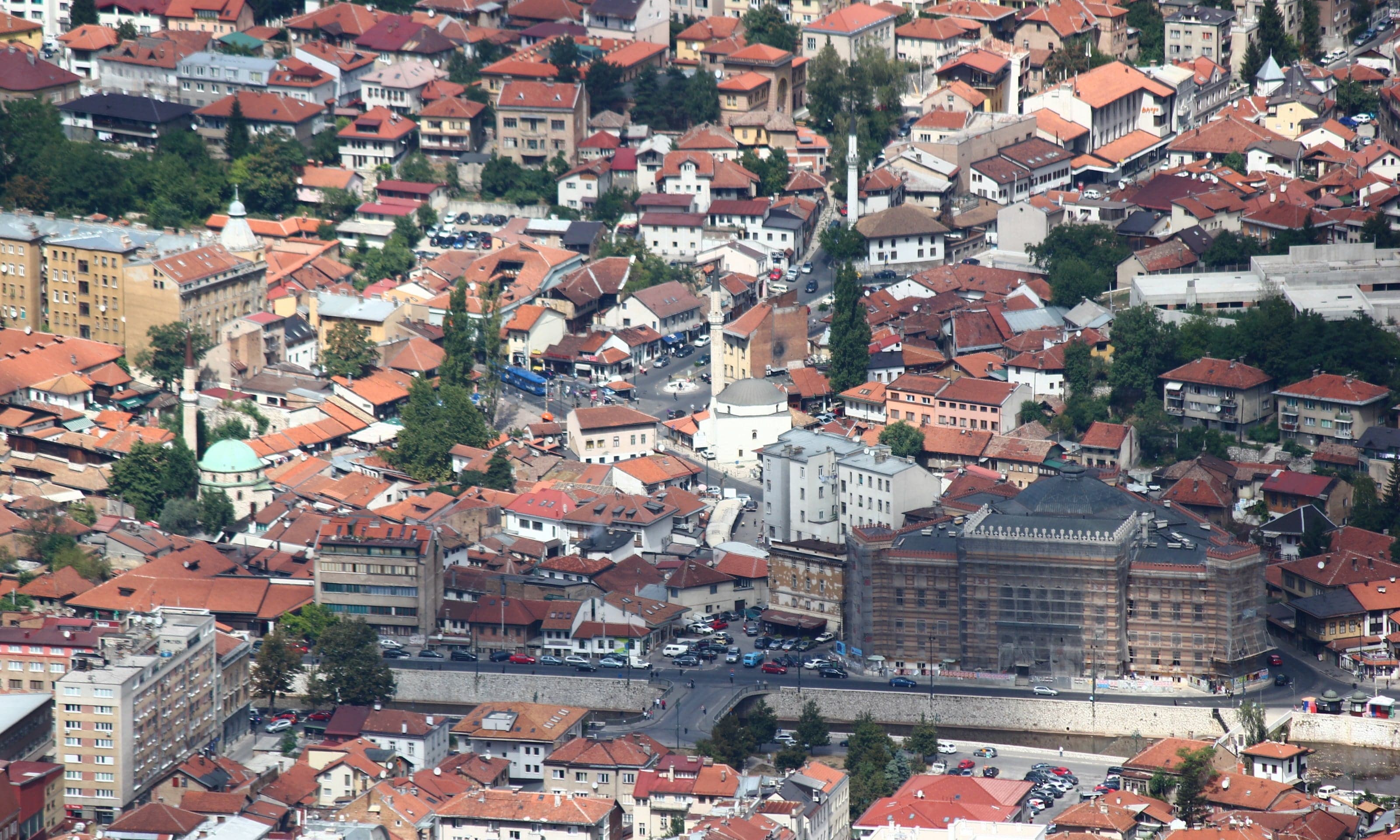 The cobblestone lanes of Baščaršija bazaar in Sarajevo with copper workshops and wooden stalls