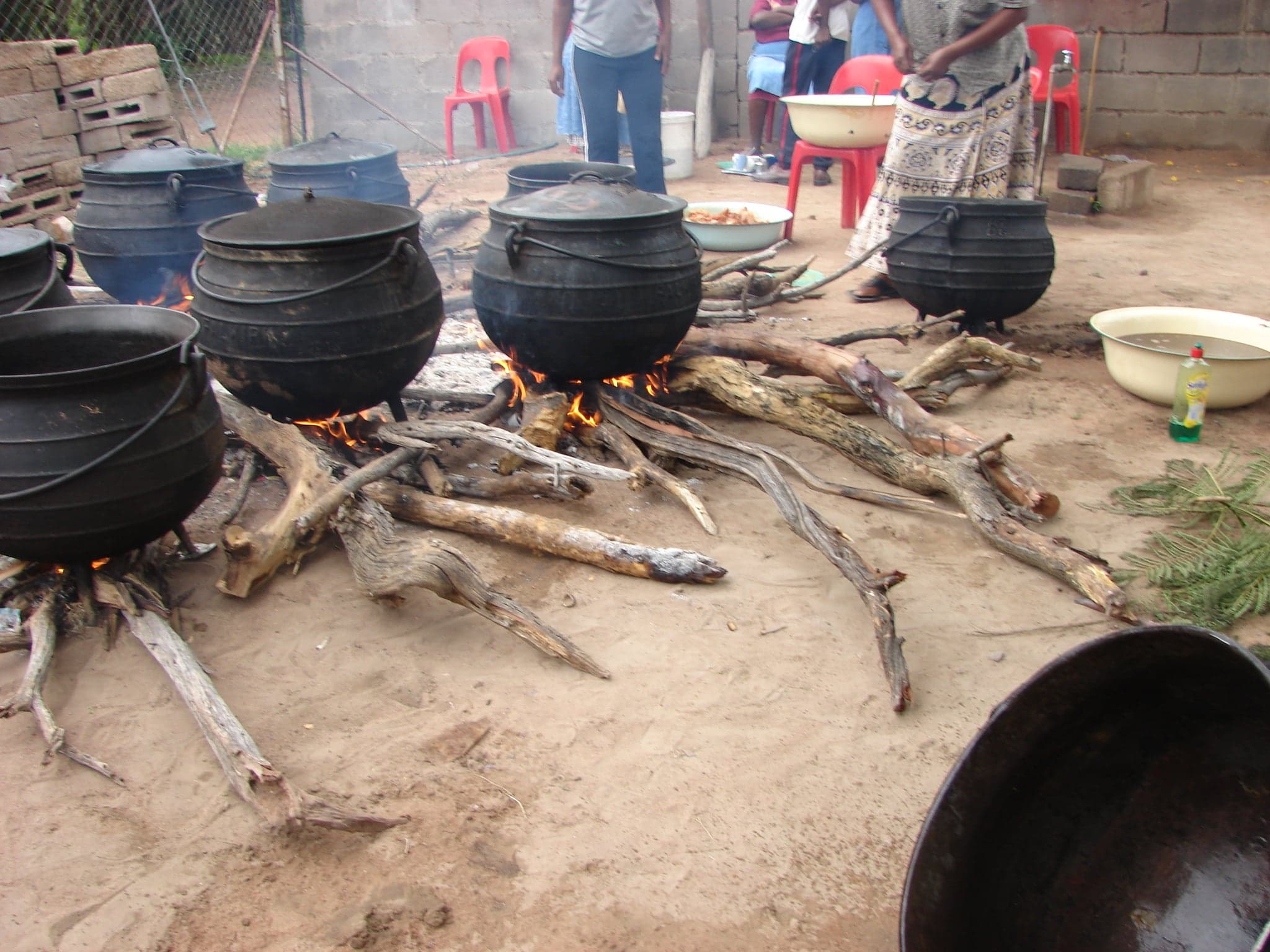 A clay pot of seswaa - shredded slow-cooked meat - served alongside bogobe porridge