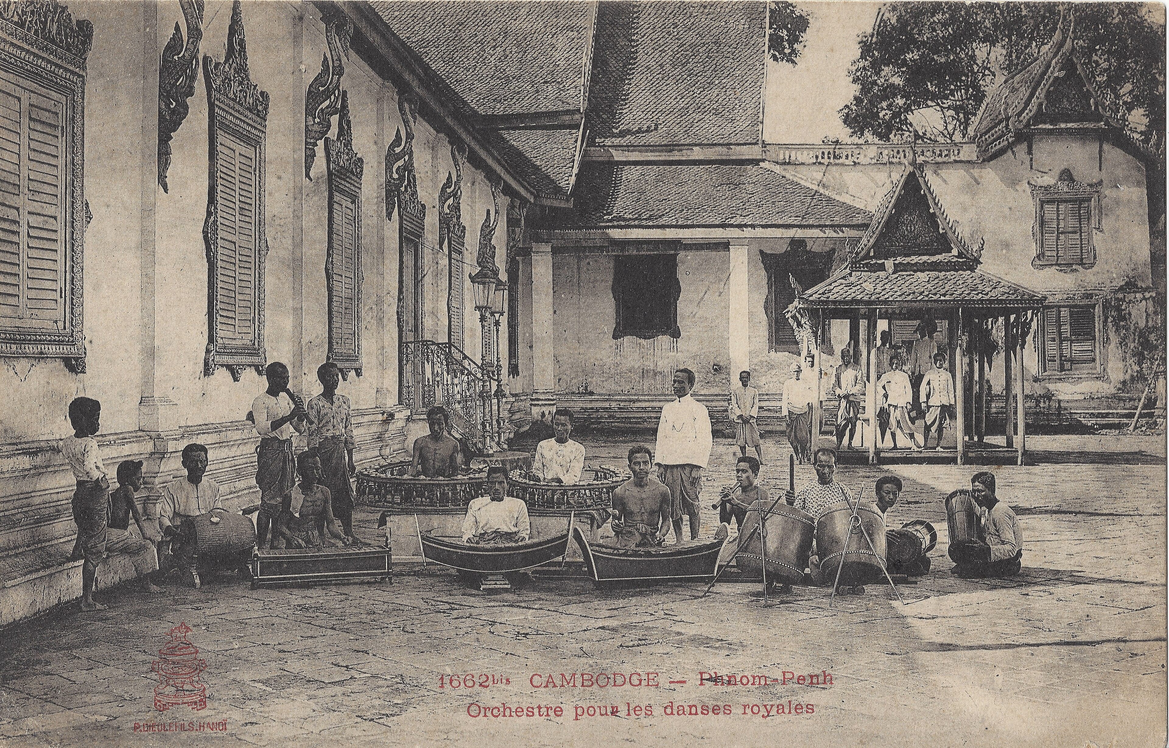 Cambodian musicians playing the pin peat orchestra with xylophones and drums