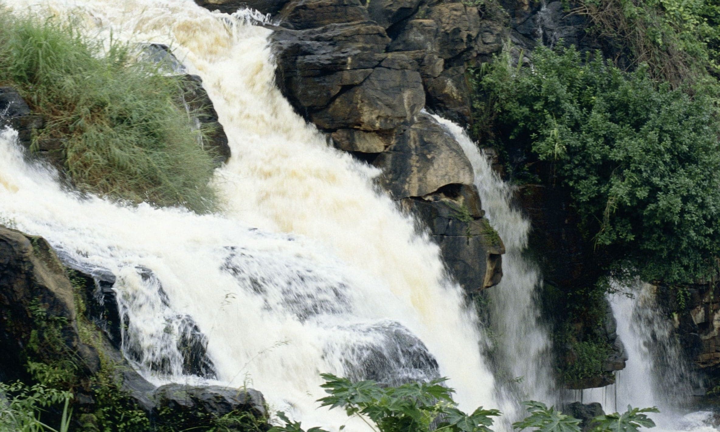 Boali Falls cascading over a wide rocky ledge in the Central African Republic