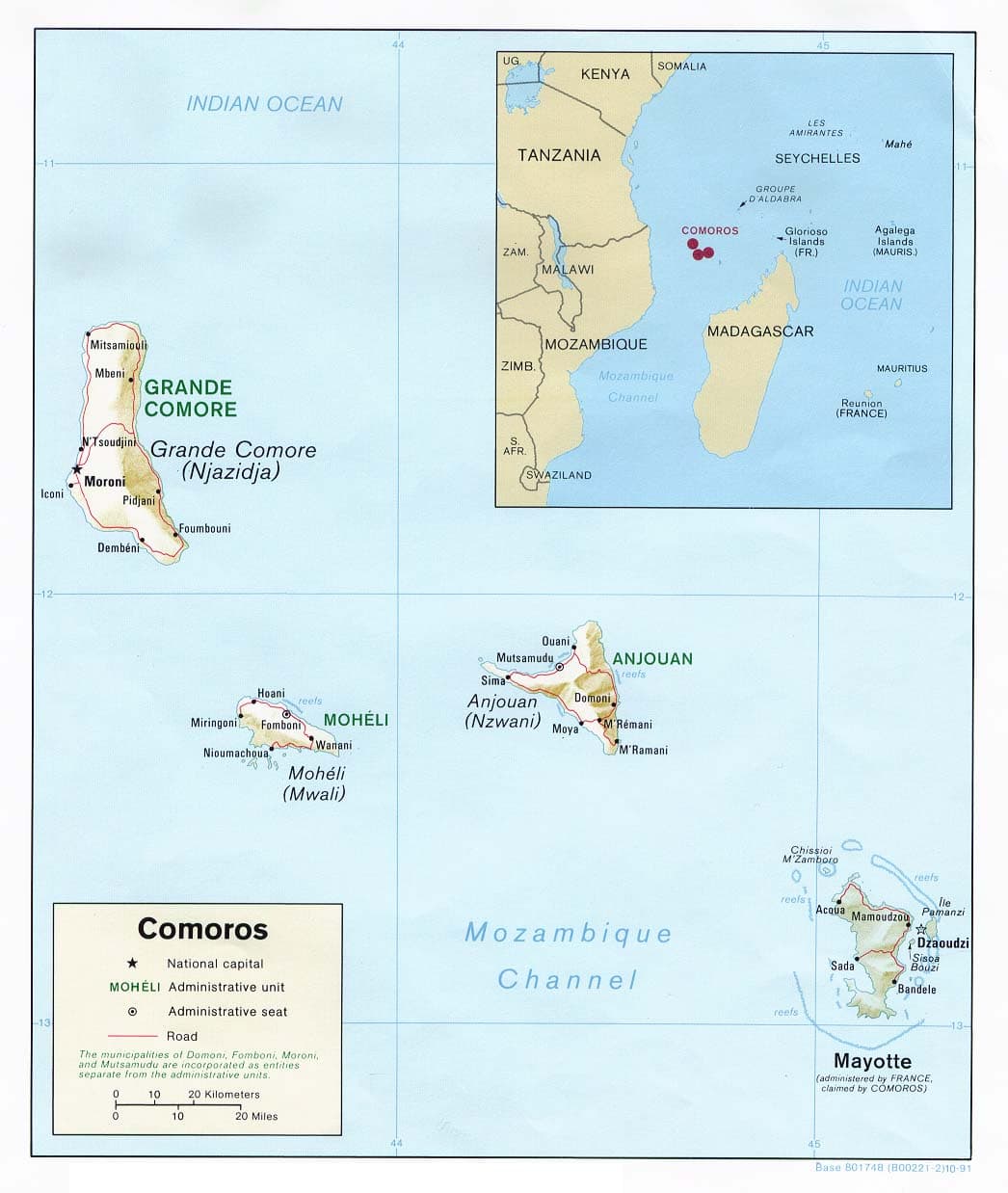 Aerial view of lush green Comorian islands surrounded by turquoise Indian Ocean water