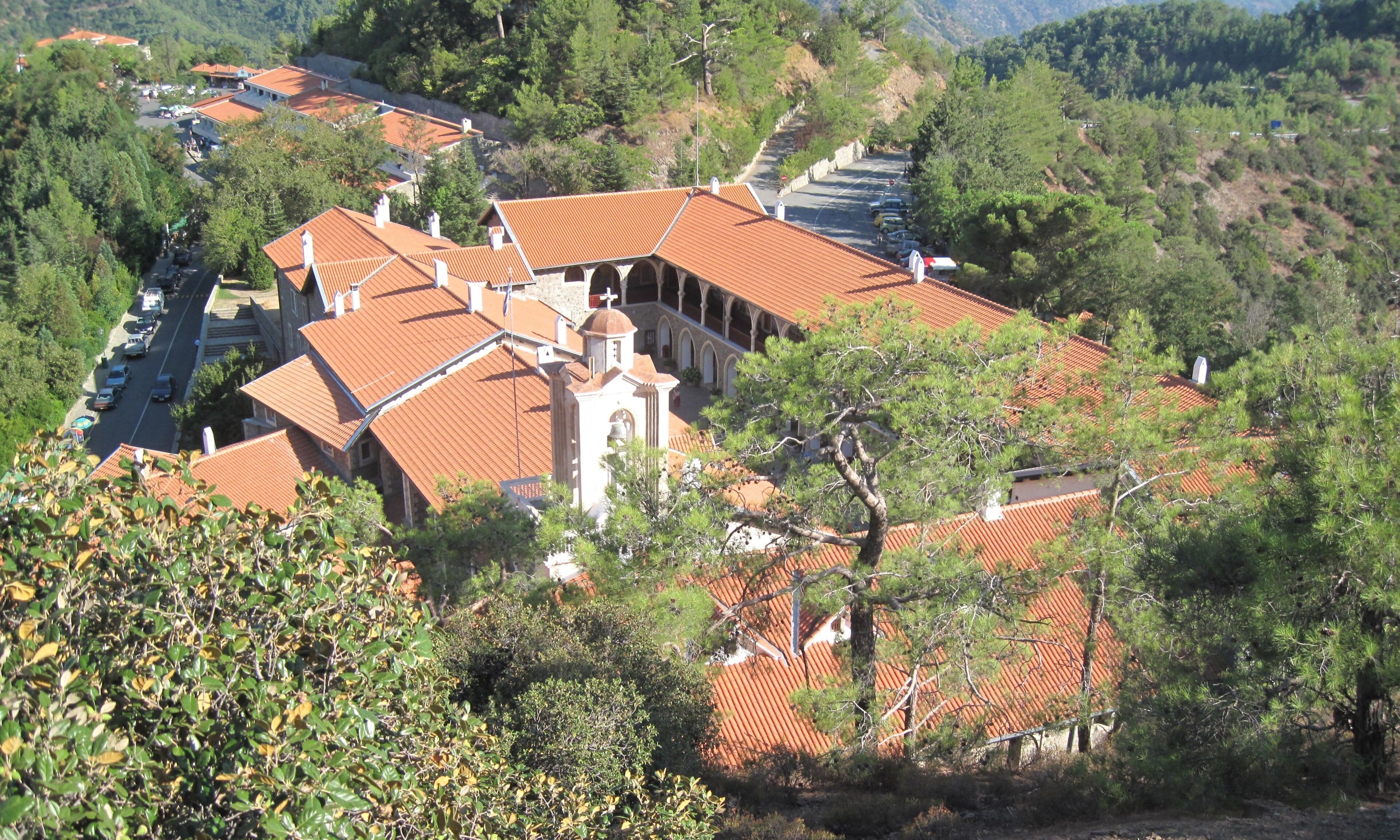 The gold and red courtyard of Kykkos Monastery in the Troodos mountains