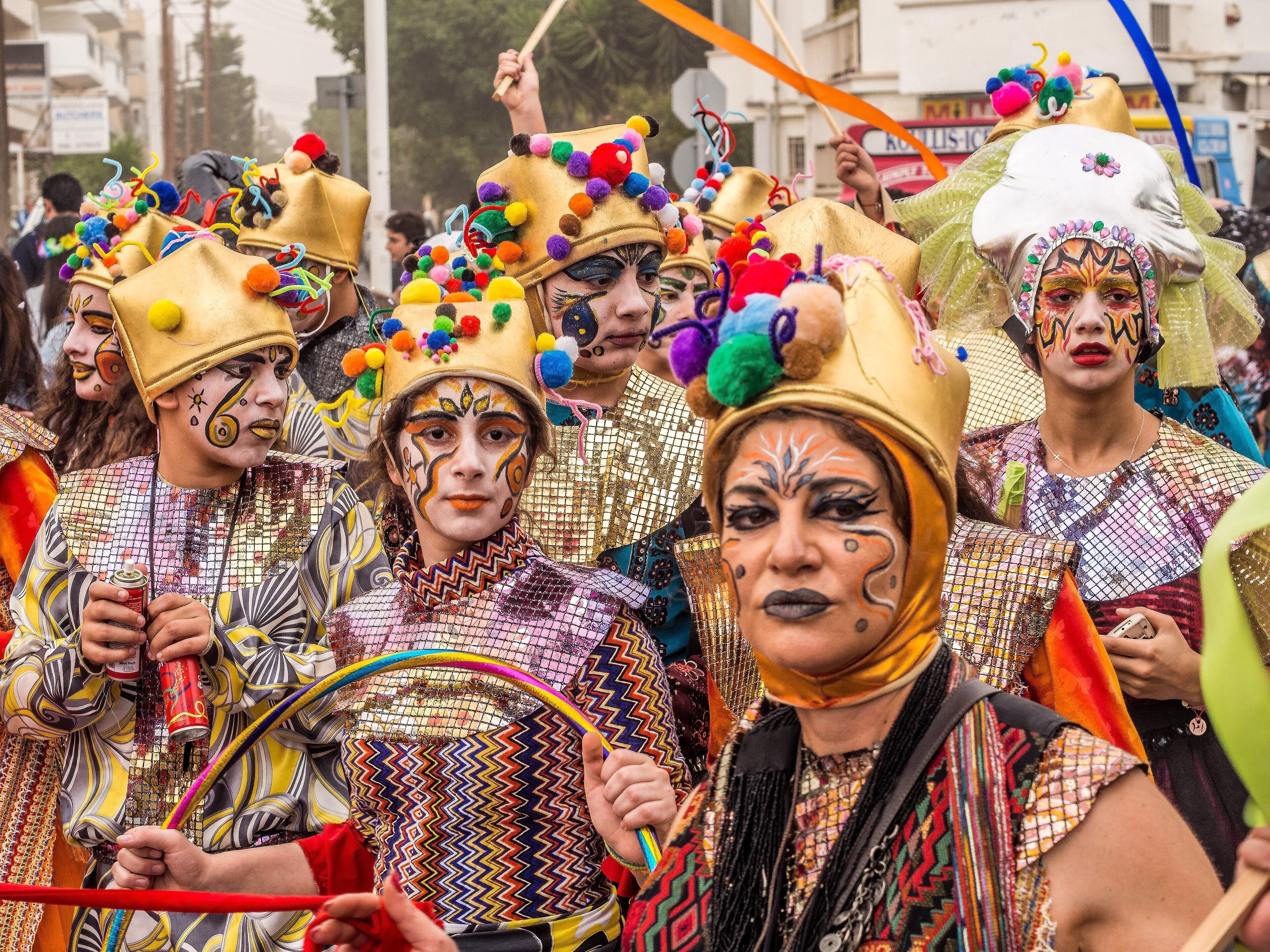Colourfully costumed carnival dancers parading through the streets of Limassol