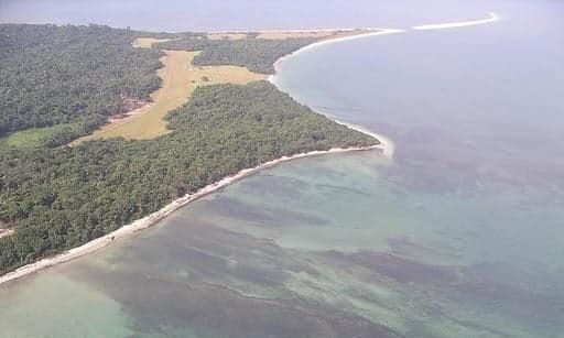 Clear blue water and white sand around Corisco Island in Equatorial Guinea