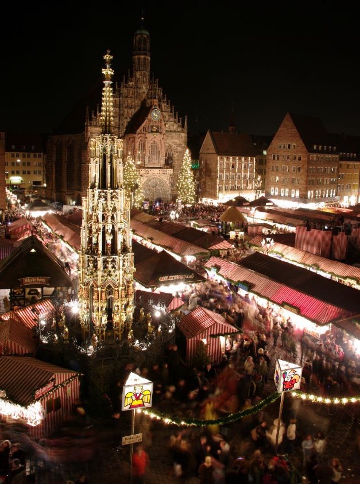 A Christmas market in Nuremberg lit up at night