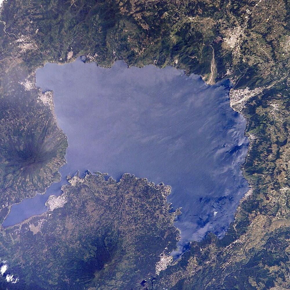 Lake Atitlán with the Tolimán and Atitlán volcanoes reflected in the water
