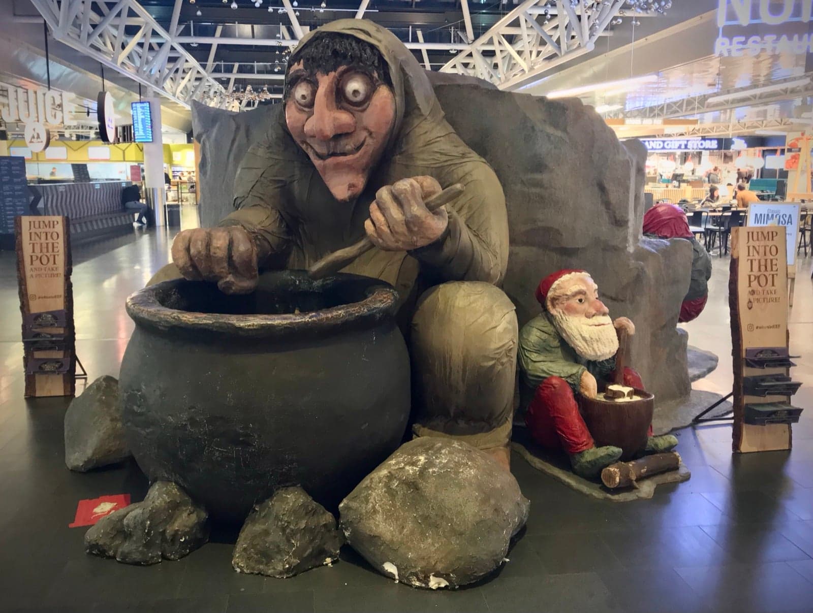 A wooden sculpture of the cheeky Icelandic Yule Lads in their traditional outfits