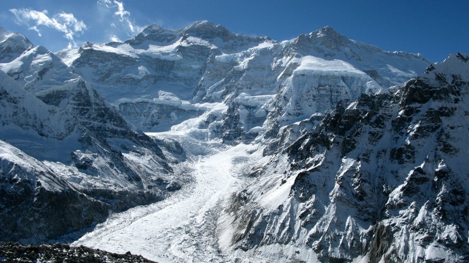 The snowy peaks of Kangchenjunga rising above a glacier
