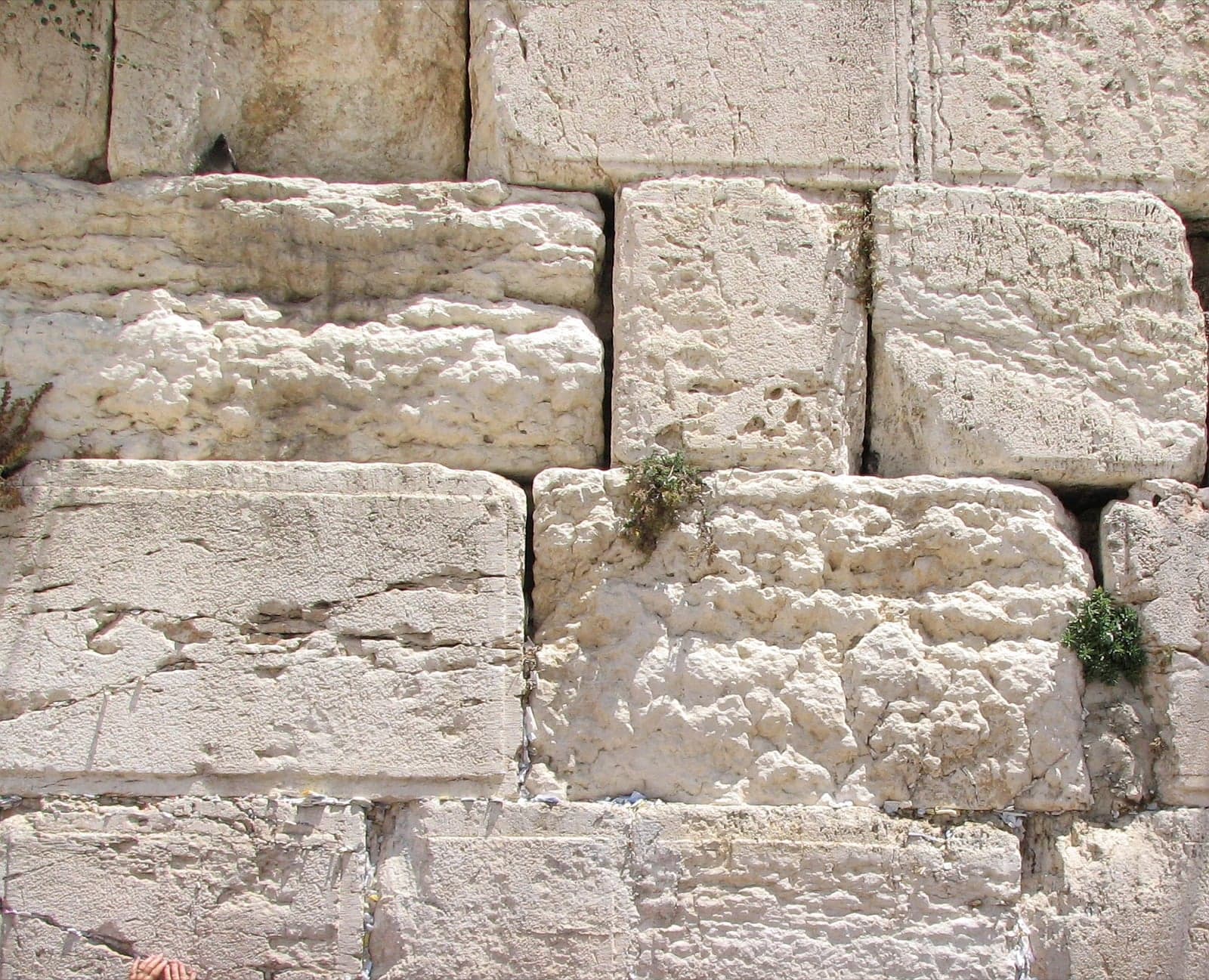 Pale limestone walls and stone alleyways of Jerusalem's old city