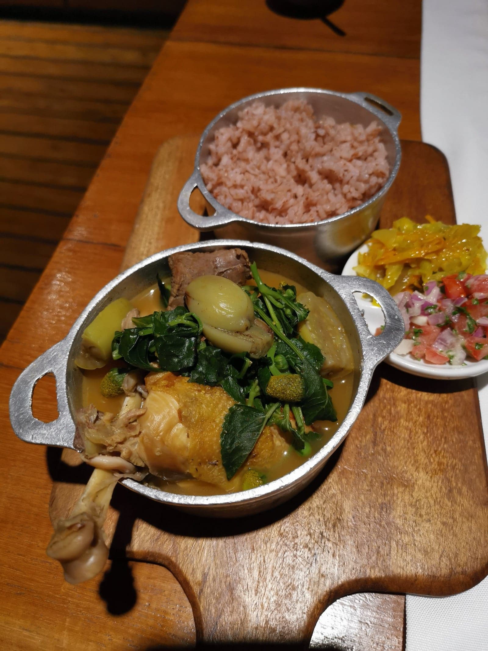 A plate of romazava, a Malagasy beef and green-leaf stew, served with rice