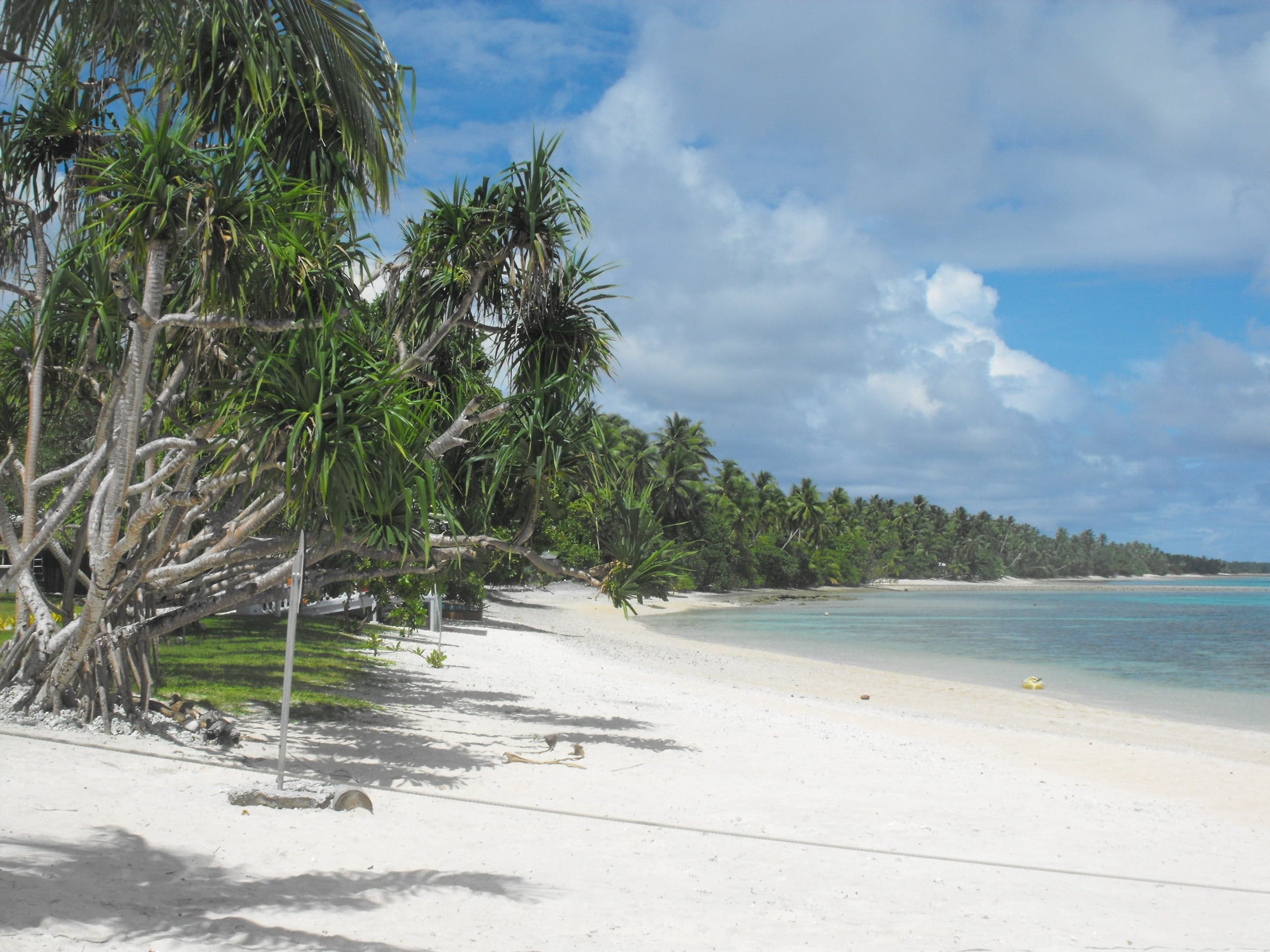 A view along the narrow strip of Majuro atoll with the lagoon on one side and the ocean on the other