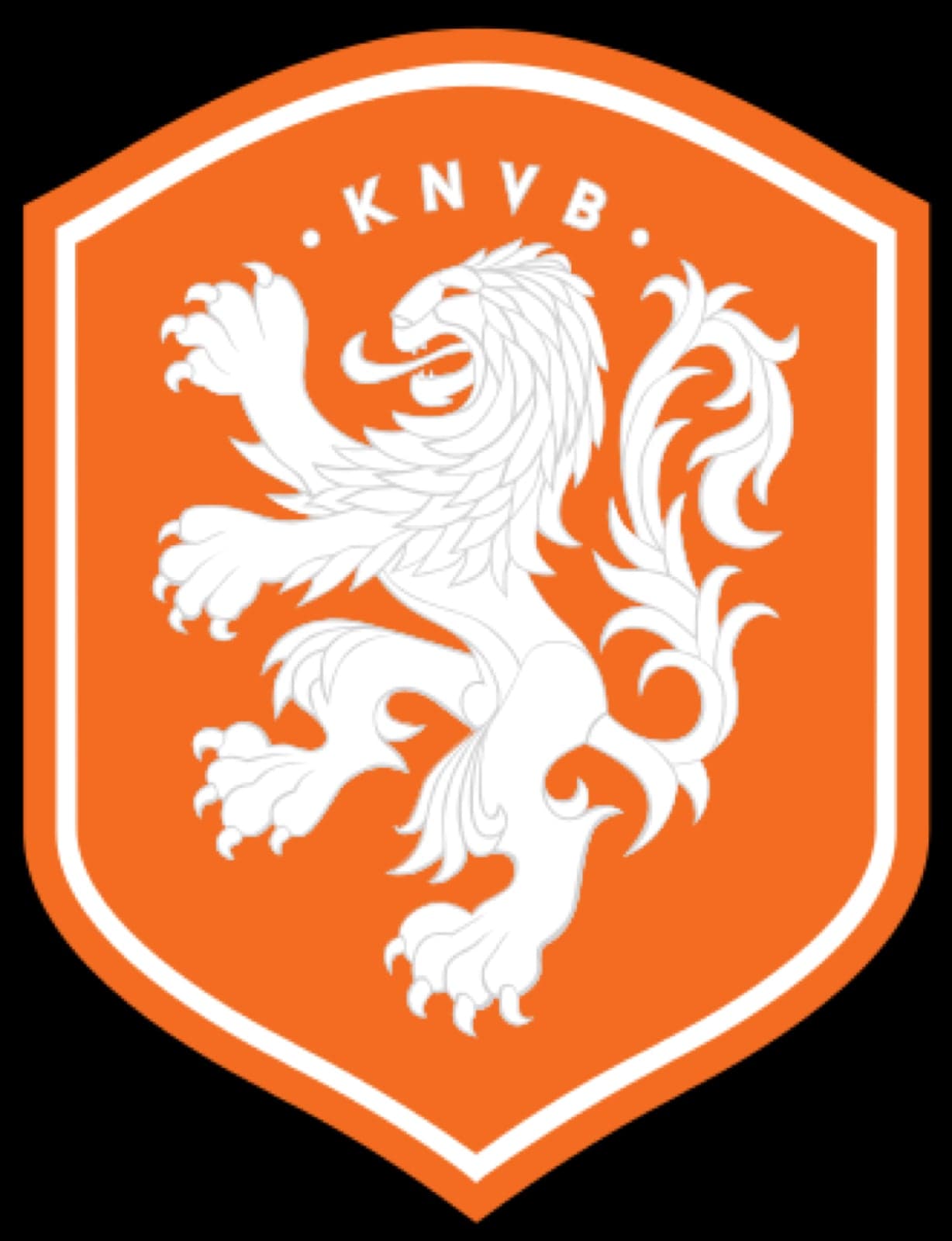Children playing football on a Dutch sports field wearing orange shirts