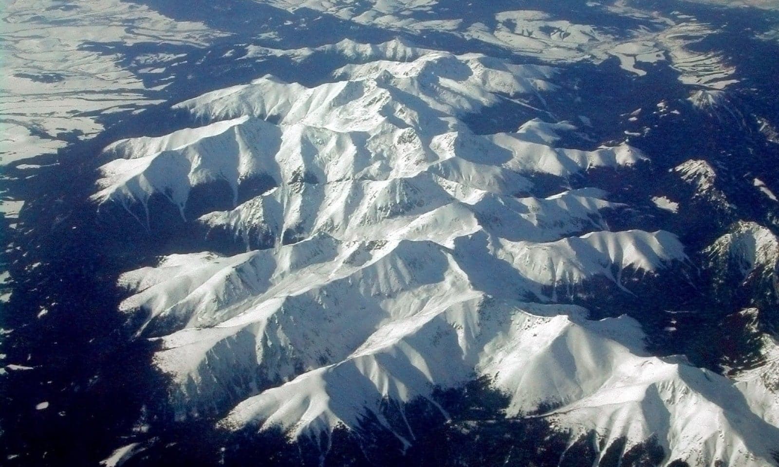 The jagged snow-capped peaks of the Tatra Mountains