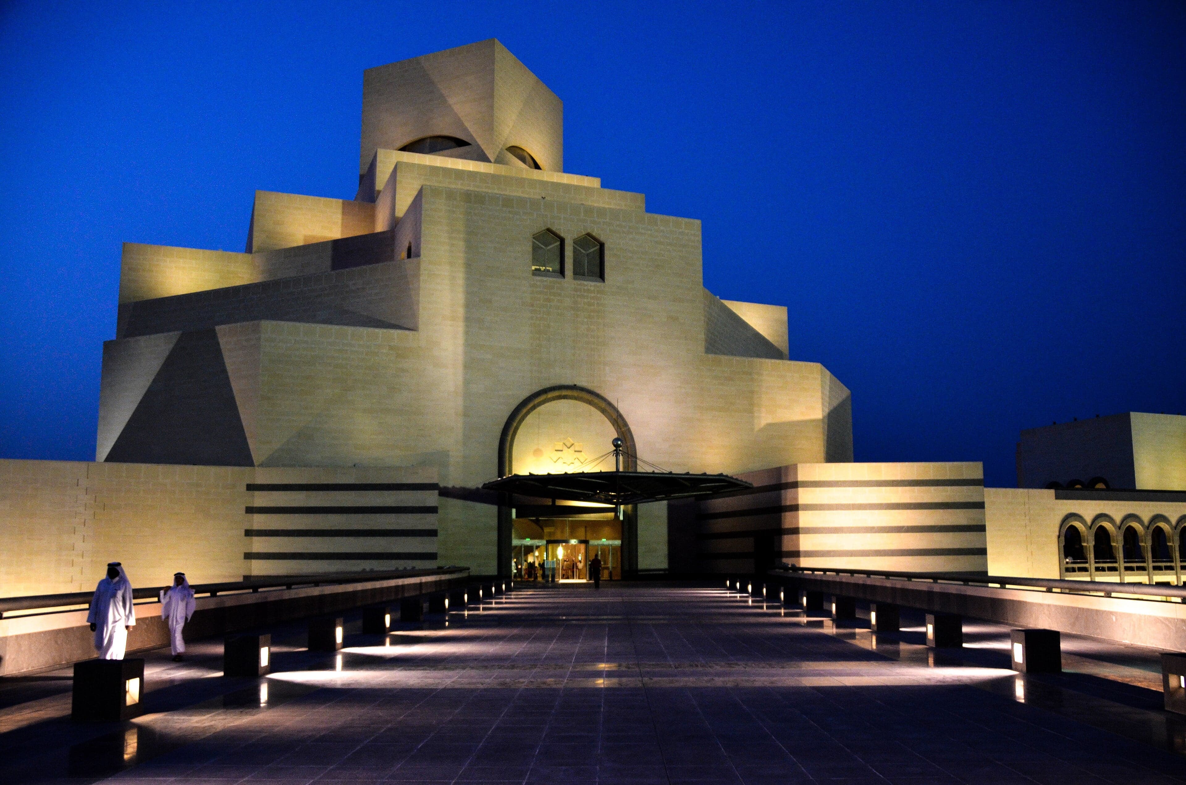 The white geometric Museum of Islamic Art rising from its own island in Doha harbour