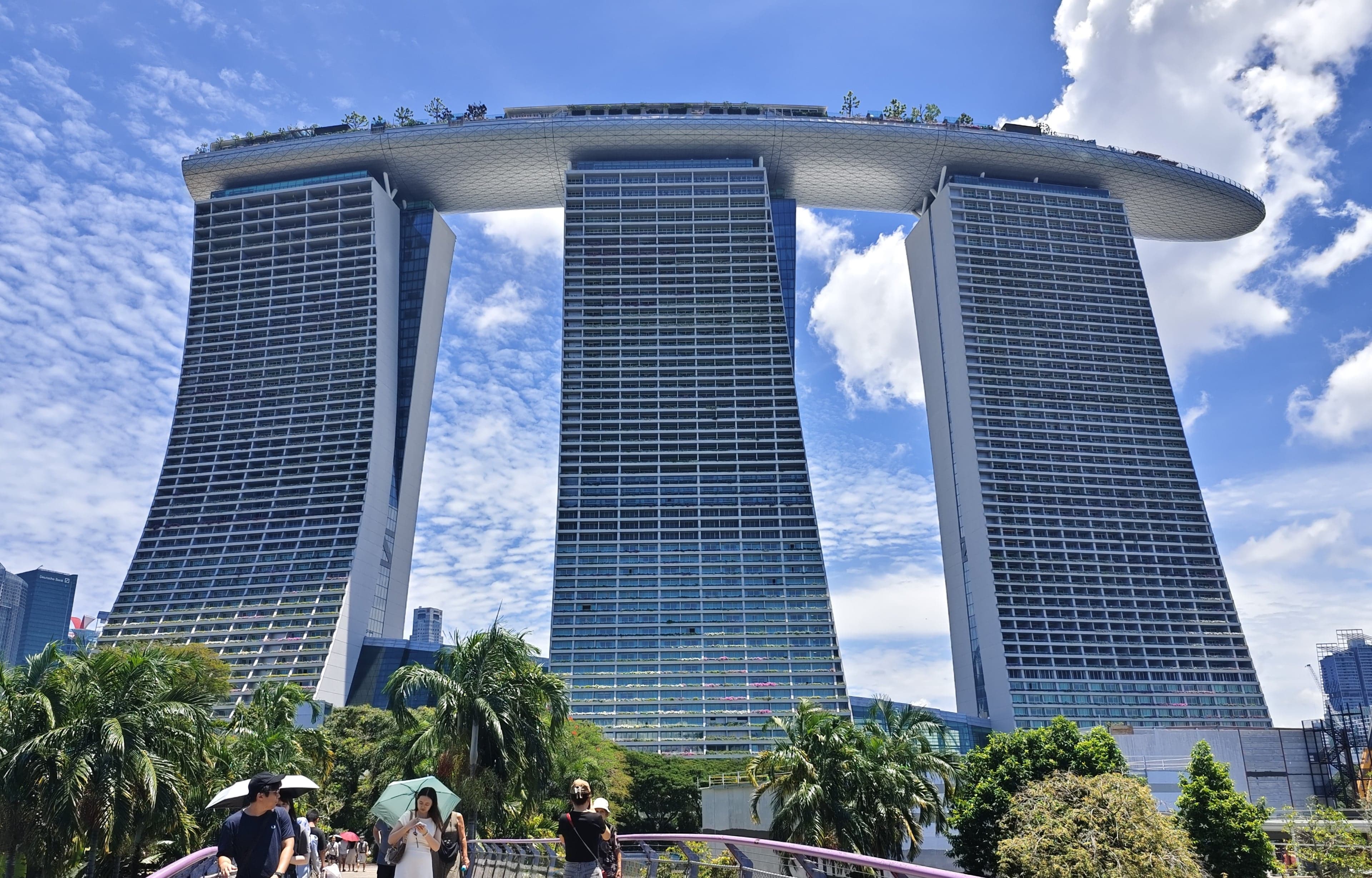 Singapore's skyline at Marina Bay with greenery in the foreground