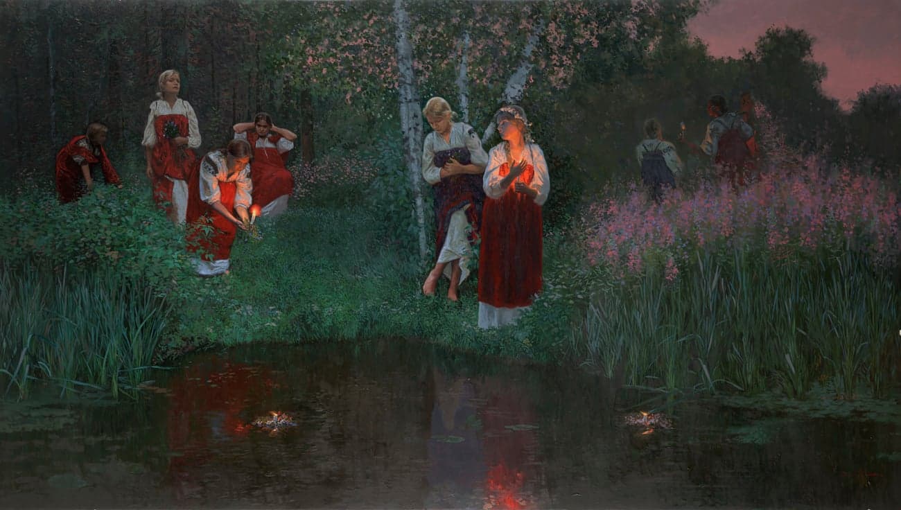 Girls wearing flower wreaths floating on a river at sunset