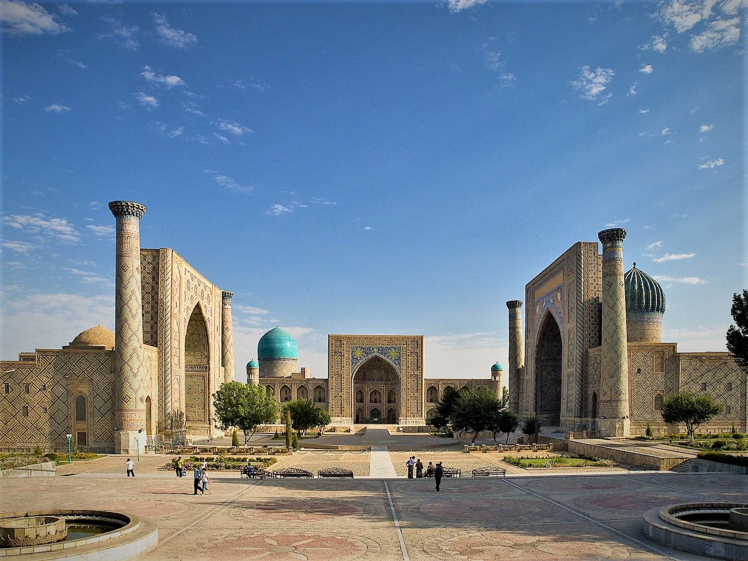 The blue-tiled domes and tall arches of Registan Square in Samarkand