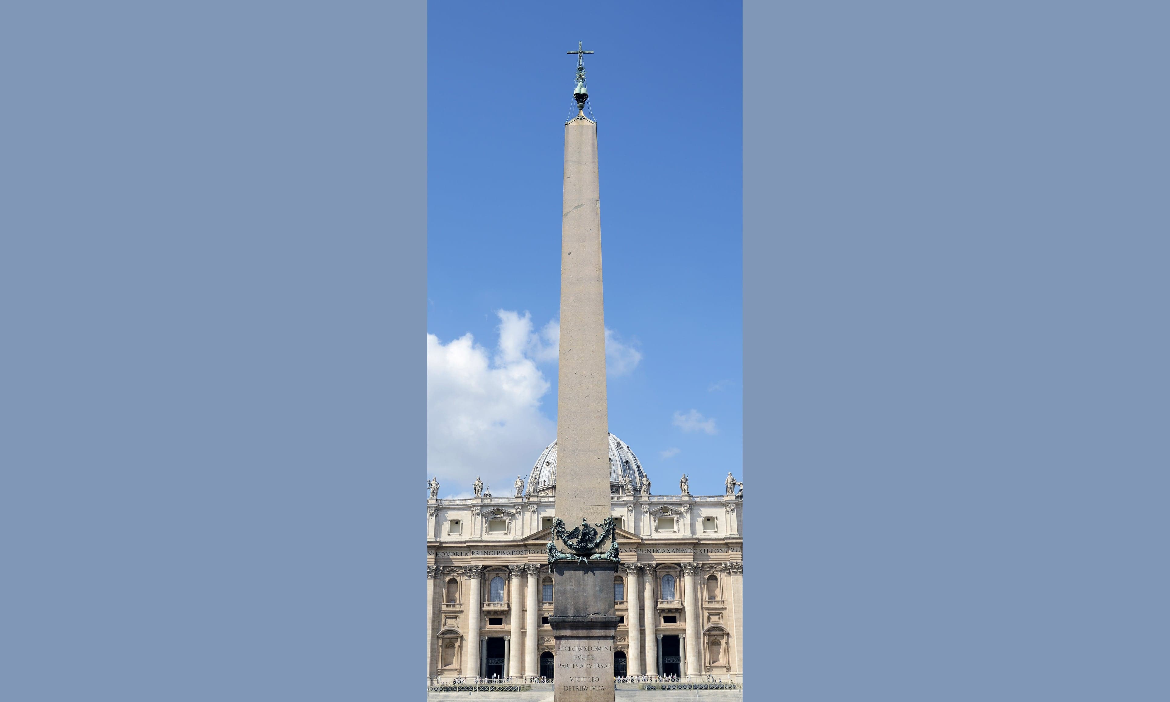 The tall Egyptian obelisk standing in the centre of St Peter's Square