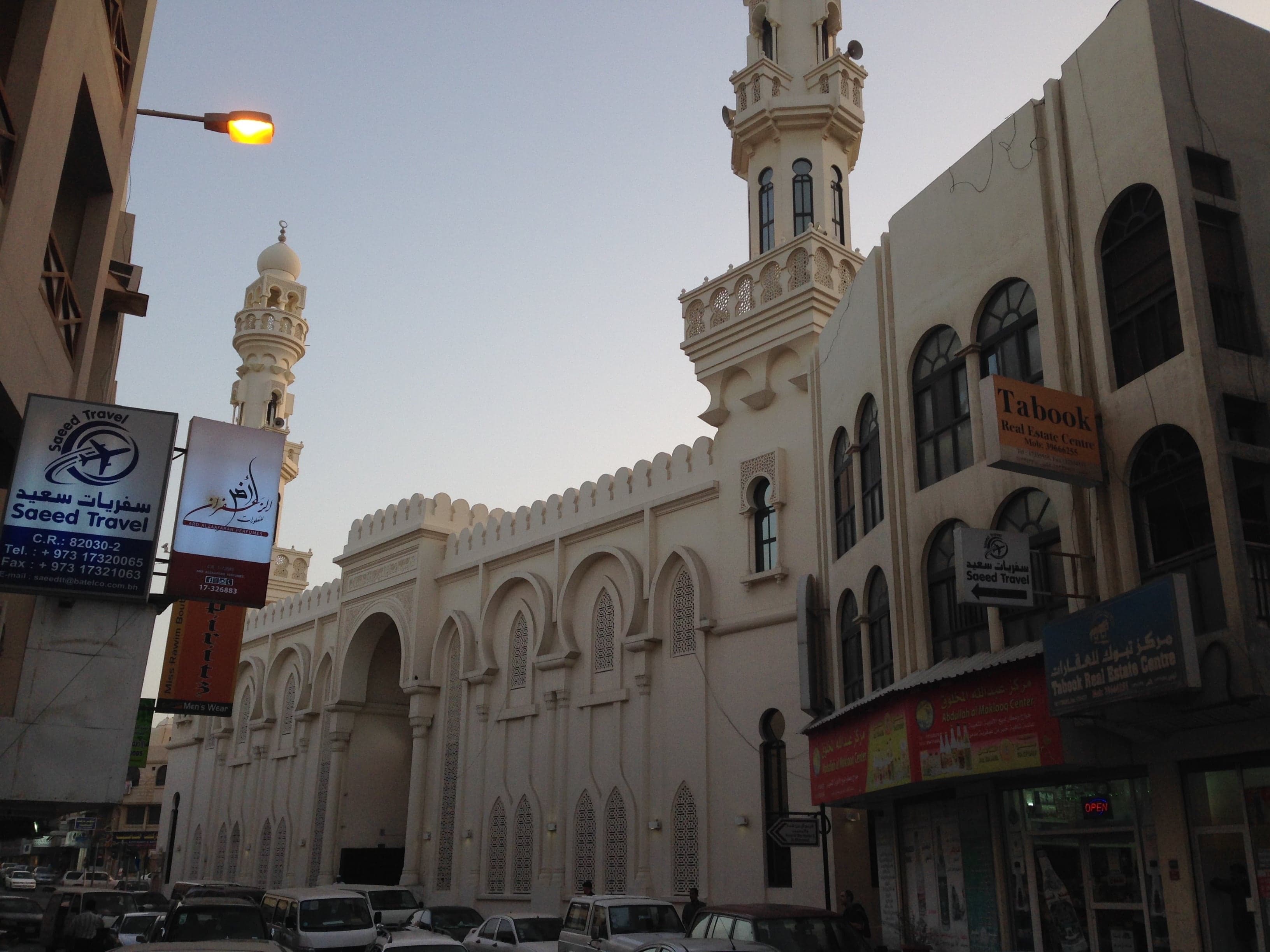 Traditional pearl diving equipment and a lustrous pearl displayed in Bahrain