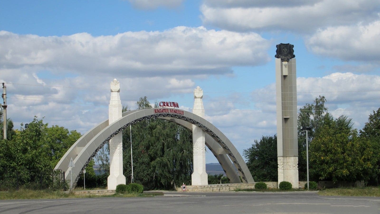 Wide underground tunnels carved through white limestone rock in Cricova