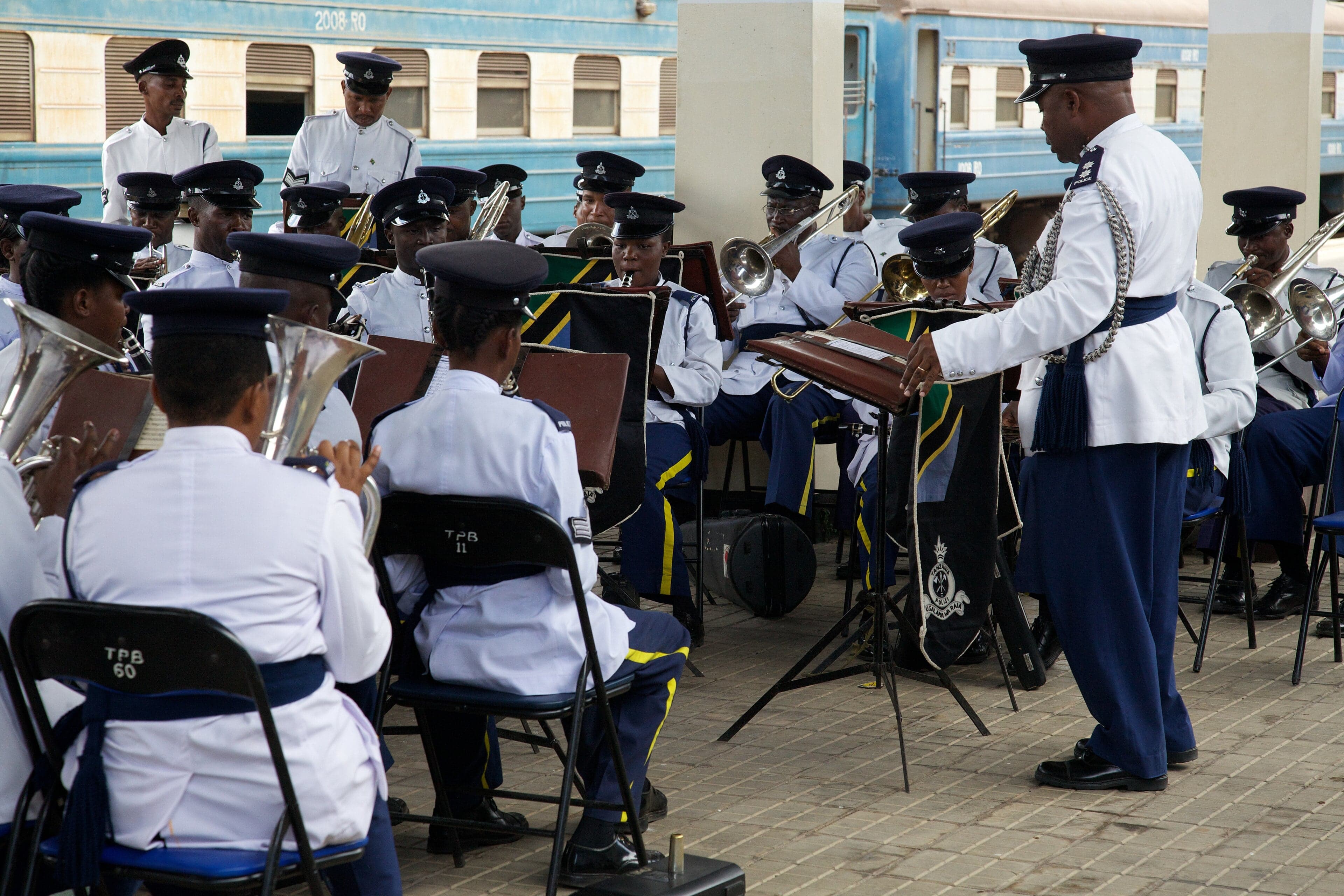 Monaco's brass band marching in uniform during a national celebration