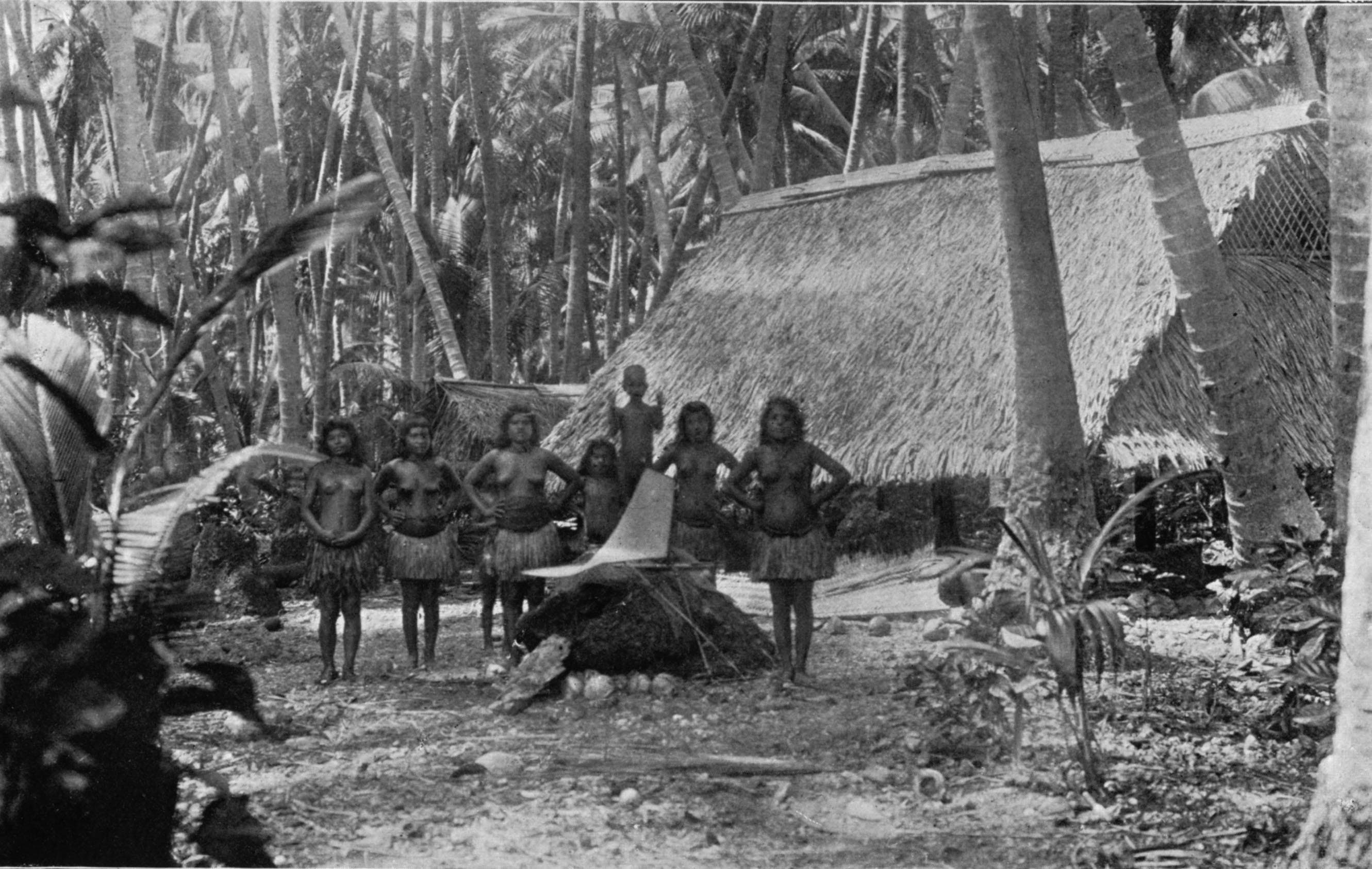Nauruan community members celebrating together with flowers and traditional dress