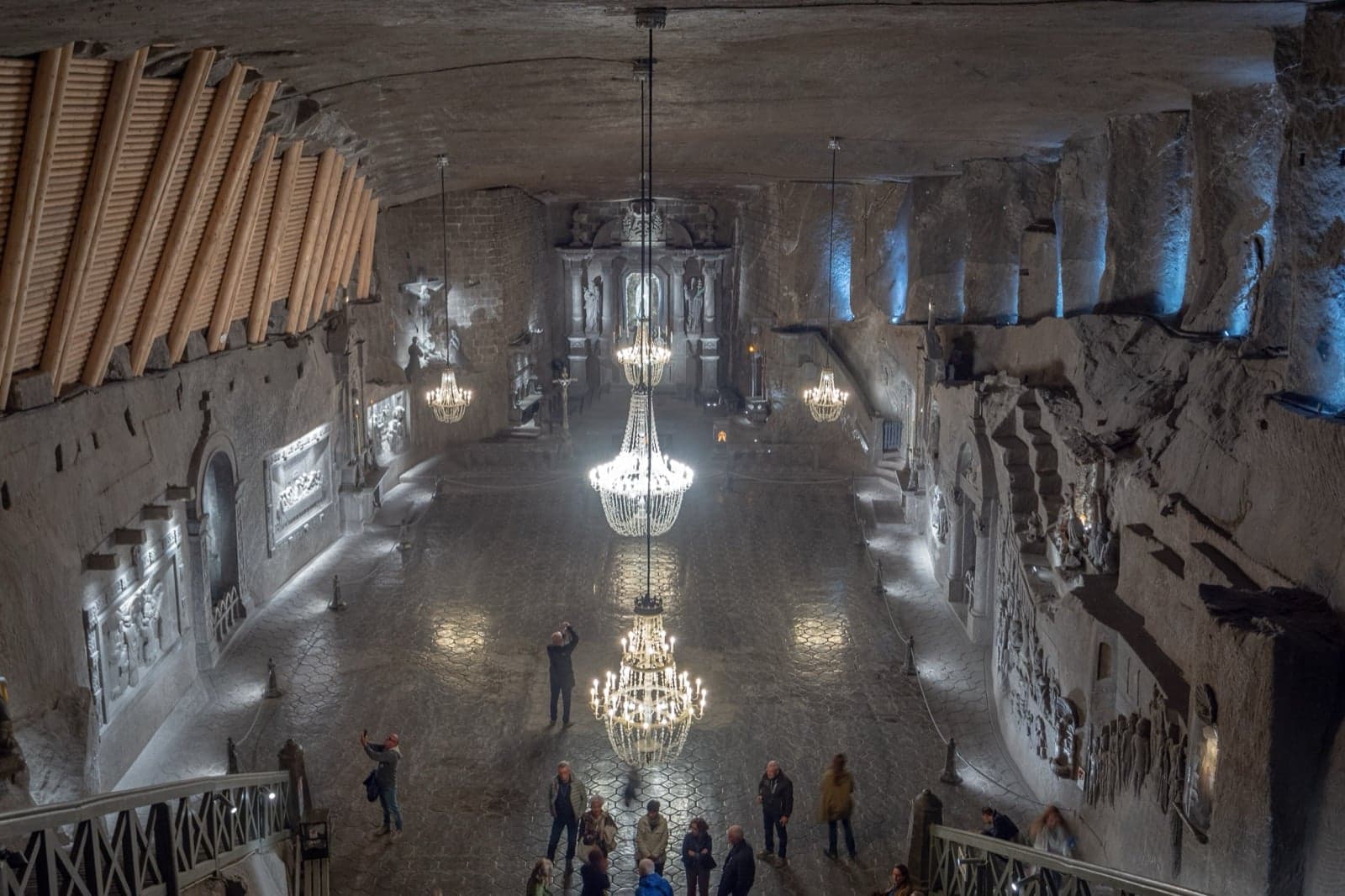 A chapel carved deep inside the Wieliczka Salt Mine, with salt chandeliers