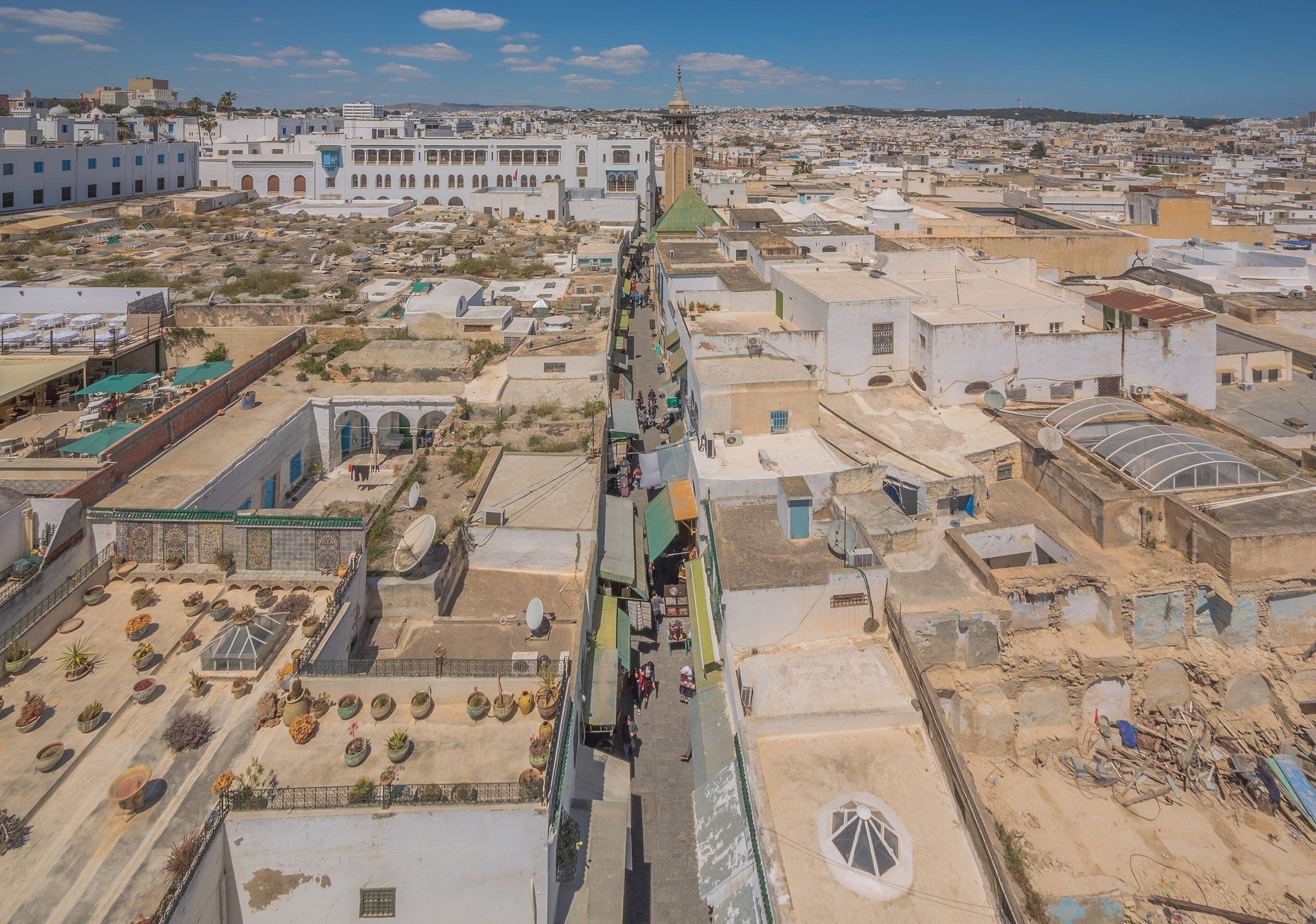 Colourful arched doorways and narrow lanes inside the Medina of Tunis